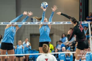 Creighton Bluejays Ava Martin (8) blocks a spike during a volleyball match against Louisville on Friday, September 12th, 2025 in Omaha, Nebraska. Photo by Brandon Tiedemann.