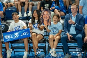 A family holds up an Ava Martin sign during a volleyball match against Louisville on Friday, September 12th, 2025 in Omaha, Nebraska. Photo by Brandon Tiedemann.