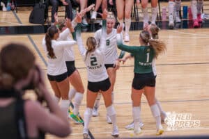 Koco Janssen celebrates with her team after the ace during the Elkhorn North Volleyball game vs Gretna on September 2nd, 2025 in Omaha, Nebraska. Photo by Drew Balus