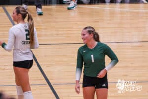 Lily Zimmerman smiles during the Elkhorn North Volleyball game vs Gretna on September 2nd, 2025 in Omaha, Nebraska. Photo by Drew Balus