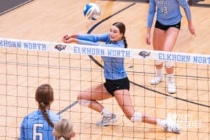 The Elkhorn North volleyball player digs the ball during the Elkhorn North Volleyball game vs Gretna on September 2nd, 2025 in Omaha, Nebraska. Photo by Drew Balus