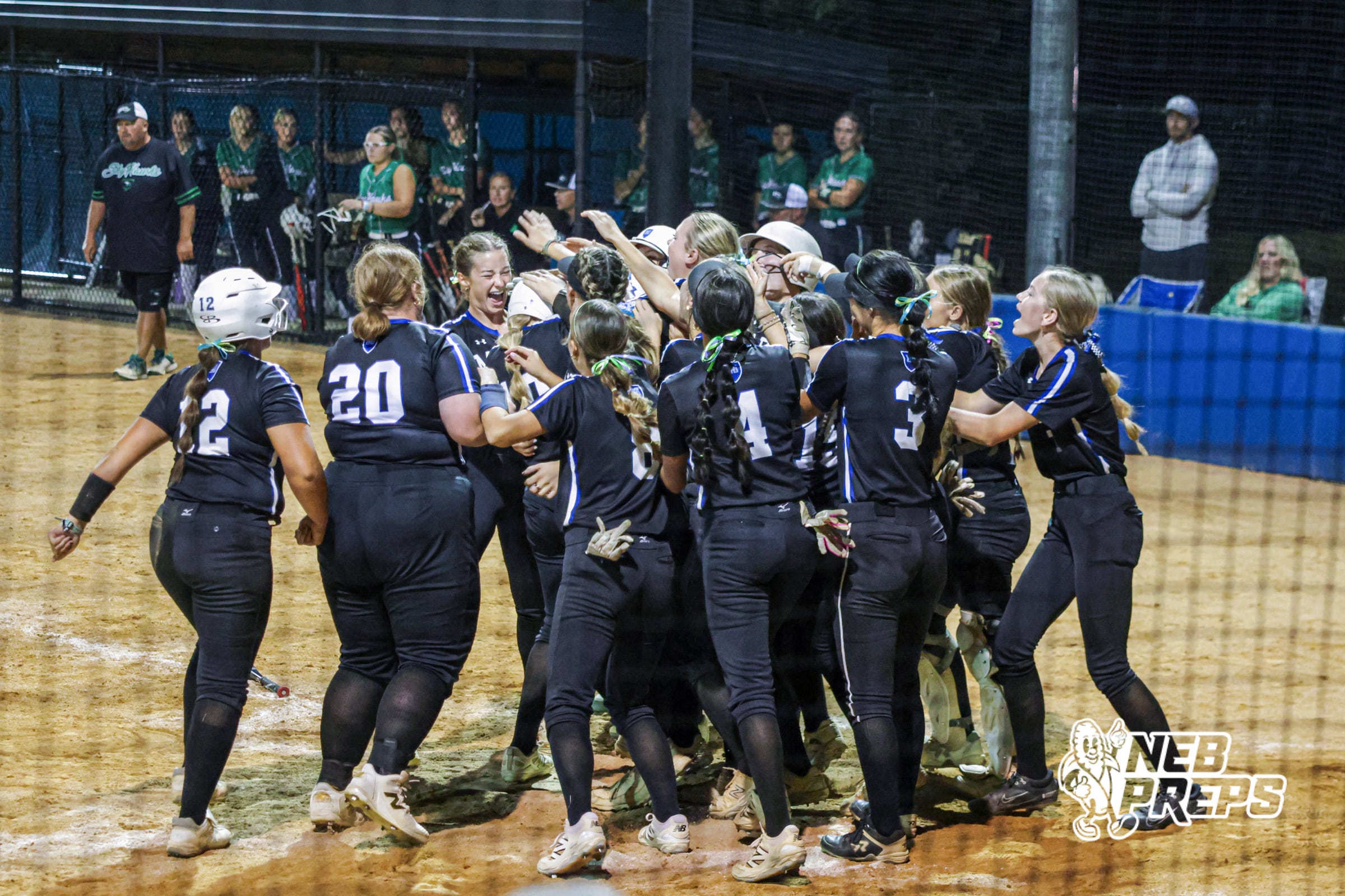 Marian celebrates after the homerun during the Skutt vs Marian Softball game on September 4th, 2025 in Omaha, Nebraska. Photo by Drew Balus