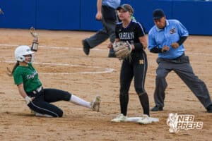 The skutt batter slides into second base during the Skutt vs Marian Softball game on September 4th, 2025 in Omaha, Nebraska. Photo by Drew Balus