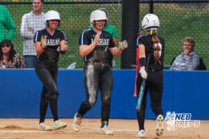 Aubrey Mueting and Addy Bernal smile during the Skutt vs Marian Softball game on September 4th, 2025 in Omaha, Nebraska. Photo by Drew Balus