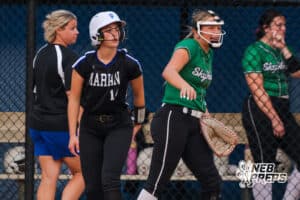 The first baseman screams while Marian player Alaina Kroll stays on first base during the Skutt vs. Marian Softball game on September 4, 2025, in Omaha, Nebraska. Photo by Drew Balus