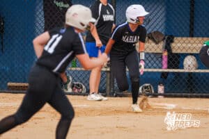 The Marian players begin to run the bases during the Skutt vs Marian Softball game on September 4th, 2025 in Omaha, Nebraska. Photo by Drew Balus
