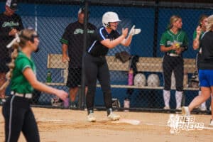 Aubrey Mueting claps during the Skutt vs Marian Softball game on September 4th, 2025 in Omaha, Nebraska. Photo by Drew Balus