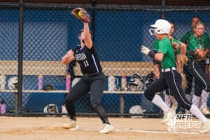 Marian's Aubrey Mueting catches the ball at first during the Skutt vs Marian Softball game on September 4, 2025 in Omaha, Nebraska. Photo by Drew Balus.