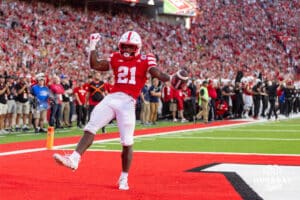 Nebraska Cornhusker Emmett Johnson (21) celebrates scoring a touchdown in the second quarter against the Akron Zips during a college football game on Saturday, September 6, 2025 in Lincoln, NE. Photo by John S. Peterson.