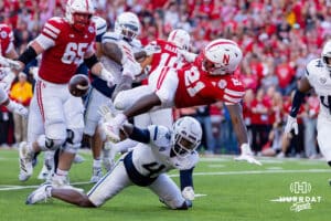 Nebraska Cornhusker Emmett Johnson (21) fumbles the ball in the first quarter against the Akron Zips during a college football game on Saturday, September 6, 2025 in Lincoln, NE. Photo by John S. Peterson.