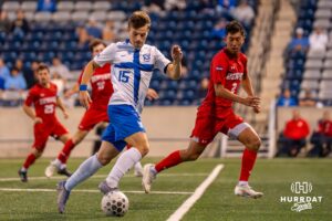 Ben Foulks dribbles the ball. Creighton men's hosted Denver at Morrison Stadium in Omaha, Nebraska for Socctoberfest on September 5th, 2025. Photo by Kyle Byers.