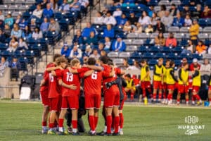 Denver huddles before the game. Creighton men's hosted Denver at Morrison Stadium in Omaha, Nebraska for Socctoberfest on September 5th, 2025. Photo by Kyle Byers.