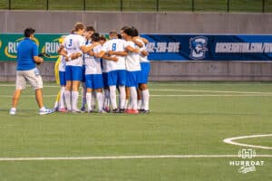Creighton huddles before the game. Creighton men's hosted Denver at Morrison Stadium in Omaha, Nebraska for Socctoberfest on September 5th, 2025. Photo by Kyle Byers.