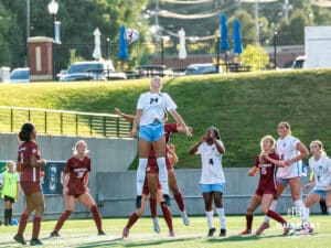 Mallory Connealy takes flight attempting to head the ball. Creighton women's soccer hosted Arkansas at Morrison Stadium for Socctoberfest on September 5th, 2025.