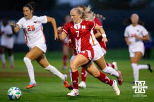 Cornhusker Forward Reagen Raabe (7) dribbles upfield past a couple Oregon State defenders during a college soccer game, Thursday, September 4th, 2025, Lincoln, Nebraska. Photo by Braden Cochran.