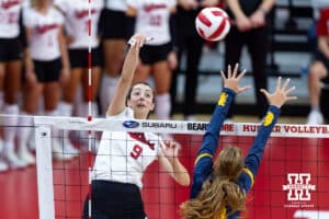Nebraska Cornhusker Virginia Adriano (9) spikes the ball against the California Golden Bears in the second set during a college volleyball match on Sunday, September 7, 2025 in Lincoln, NE. Photo by John S. Peterson.