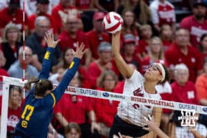 Nebraska Cornhusker Rebekah Allick (5) spikes the ball against California Golden Bear Arissa Carbonara (17) in the first set during a college volleyball match on Sunday, September 7, 2025 in Lincoln, NE. Photo by John S. Peterson.
