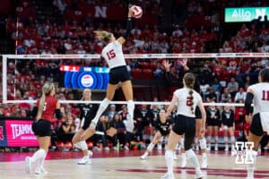 Nebraska Cornhusker Andi Jackson (15) spikes the ball against the Wright State Raiders in the third set during a college volleyball match on Friday, September 5, 2025 in Lincoln, NE. Photo by John S. Peterson.