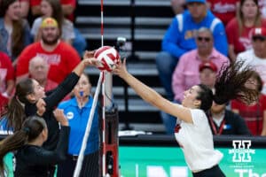 Nebraska Cornhusker Virginia Adriano (9) wins the joust against the Wright State Raiders during a college volleyball match on Friday, September 5, 2025 in Lincoln, NE. Photo by John S. Peterson.