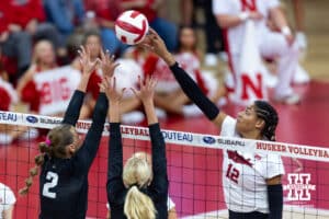 Nebraska Cornhusker Taylor Landfair (12) tips the ball over the net against the Wright State Raiders in the first set during a college volleyball match on Friday, September 5, 2025 in Lincoln, NE. Photo by John S. Peterson.