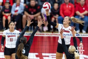 Nebraska Cornhusker Andi Jackson (15) tips the ball over the net against the Wright State Raiders in the first set during a college volleyball match on Friday, September 5, 2025 in Lincoln, NE. Photo by John S. Peterson.