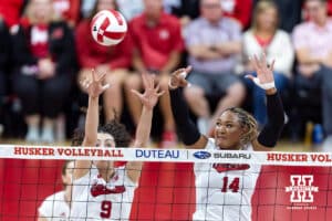 Nebraska Cornhusker Virginia Adriano (9) and Nebraska Cornhusker Manaia Ogbechie (14) block a shot against the Wright State Raiders in the first set during a college volleyball match on Friday, September 5, 2025 in Lincoln, NE. Photo by John S. Peterson.