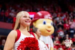 Nebraska Cornhuskers cheerleader performs at the match against the Wright State Raiders during a college volleyball match on Friday, September 5, 2025 in Lincoln, NE. Photo by John S. Peterson.