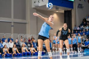 Creighton Bluejay Saige Damrow #13 catches a serve during a volleyball match against DePaul on Friday, October 31, 2025, in Omaha, Nebraska. Photo by Brandon Tiedemann.