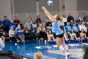 Creighton Bluejay Saige Damrow #13 saves a pass during a volleyball match against DePaul on Friday, October 31, 2025, in Omaha, Nebraska. Photo by Brandon Tiedemann.