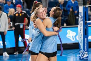 Creighton Bluejays Saige Damrow #13 and Abbey Hayes #2 hug after a win during a volleyball match against DePaul on Friday, October 31, 2025, in Omaha, Nebraska. Photo by Brandon Tiedemann.