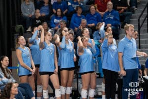 Creighton Bluejays bench cheers during a volleyball match against DePaul on Friday, October 31, 2025, in Omaha, Nebraska. Photo by Brandon Tiedemann.