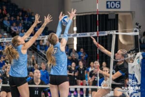 Creighton Bluejay Annalea Maeder #17 blocks a spike during a volleyball match against DePaul on Friday, October 31, 2025, in Omaha, Nebraska. Photo by Brandon Tiedemann.