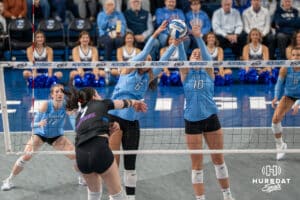 Creighton Bluejays Jaya Johnson #6 and Eloise Brandewie #10 block a spike during a volleyball match against DePaul on Friday, October 31, 2025, in Omaha, Nebraska. Photo by Brandon Tiedemann.