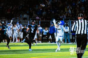 Benningtons Lane Molacek (25) is catching a deep ball before stumbling in the end zone for a touchdown during a high school football game against at Elkhorn North on Thursday, October 23, 2025 in Omaha, Nebraska. Photo By Jack Stephens.