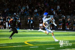 Benningtons Jake Russell (8) is running into the end zone after catching deep ball during a high school football game against Elkhorn North on Thursday, October 23, 2025 in Omaha, Nebraska. Photo By Jack Stephens.