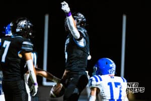 Elkhorn North Alex Uchtman (4) is signaling he got a first down after huge gain of yards during a high school football game against Bennington on Thursday, October 23, 2025 in Omaha, Nebraska. Photo By Jack Stephens.