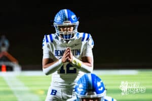 Benningtons Ty Bouaphakeo (12) is under center preparing for a pass play during a high school football game against at Elkhorn North on Thursday, October 23, 2025 in Omaha, Nebraska. Photo By Jack Stephens.