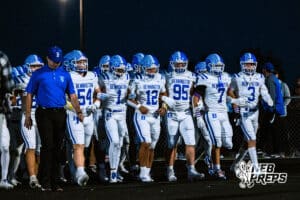 Bennington is walking out as a team before a high school football game against at Elkhorn North on Thursday, October 23, 2025 in Omaha, Nebraska. Photo By Jack Stephens.