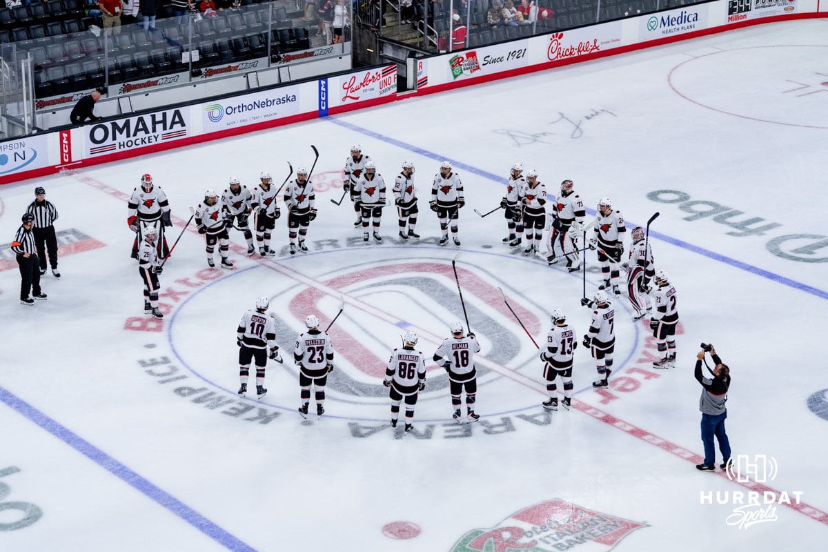 UNO v UMASS 2025-10-11 Omaha Mavericks huddle up at the end of a hockey match against the UMass Minutemen at Baxter Arena on October 24th, 2025, in Omaha, Nebraska. Photo by Collin Stilen.