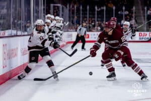 Omaha Maverick Luke Woodworth takes a shot against the UMass Minutemen during a hockey match at Baxter Arena on October 24th, 2025, in Omaha, Nebraska. Photo by Collin Stilen.