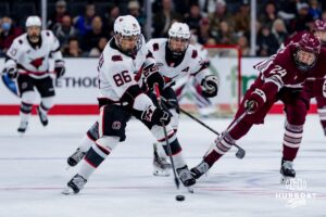 Omaha Maverick Jeremy Loranger shoots the puck against the UMass Minutemen during a hockey match at Baxter Arena on October 24th, 2025, in Omaha, Nebraska. Photo by Collin Stilen.