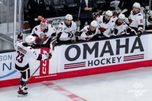 Omaha Maverick Maxime Pellerin celebrates with the bench after his goal against the UMass Minutemen during a hockey match at Baxter Arena on October 24th, 2025, in Omaha, Nebraska. Photo by Collin Stilen.
