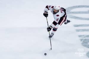 Omaha Maverick Marcus Broberg passes the puck against the UMass Minutemen during a hockey match at Baxter Arena on October 24th, 2025, in Omaha, Nebraska. Photo by Collin Stilen.