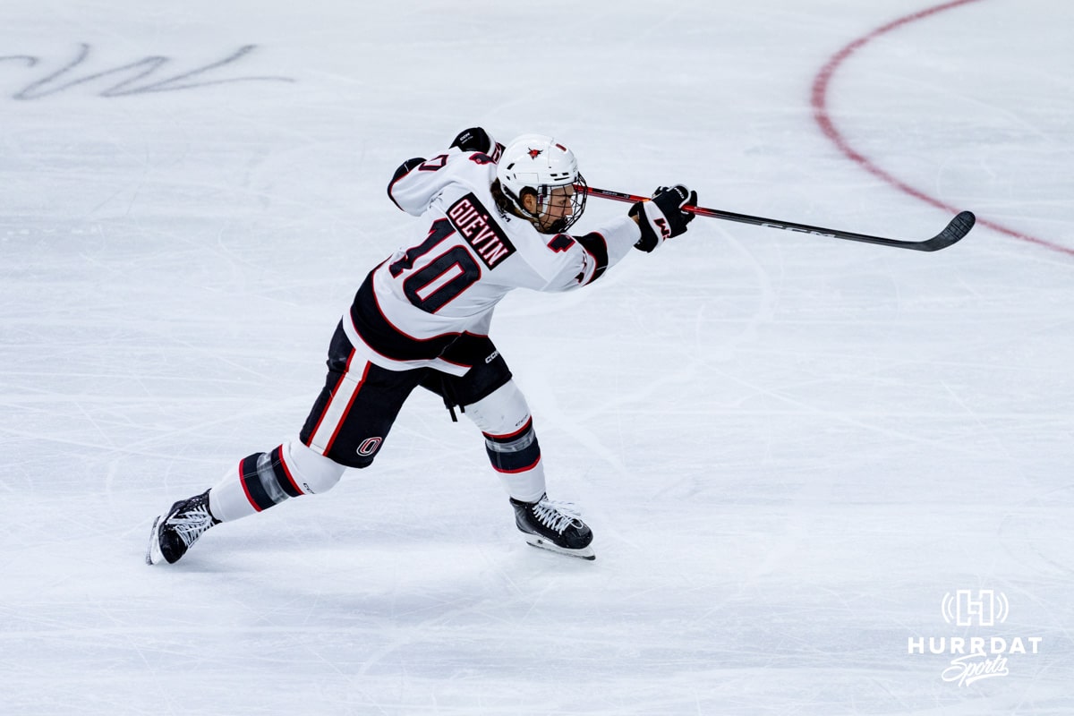 Omaha Maverick Jacob Guevin takes a shot during a hockey match against the UMass Minutemen at Baxter Arena on October 24th, 2025, in Omaha, Nebraska. Photo by Collin Stilen.