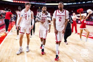 Nebraska Cornhusker Connor Essegian (0), Jamarques Lawrence (10), and Kendall Blue (2) walk off the court together after the win over the Midland Vikings during a college men’s basketball exhibition game on Monday, October 27, 2025, in Lincoln, Nebraska. Photo by John S. Peterson.