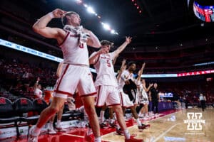 Nebraska Cornhuskers celebrate a three-pint shot against the Midland Vikings in the second half during a college men’s basketball exhibition game on Monday, October 27, 2025, in Lincoln, Nebraska. Photo by John S. Peterson.