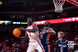 Nebraska Cornhusker Justin Bolis (7) works to the basket against Midland Viking forward Jeff Rozelle III (15) in the second half during a college men’s basketball exhibition game on Monday, October 27, 2025, in Lincoln, Nebraska. Photo by John S. Peterson.