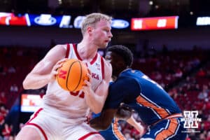 Nebraska Cornhusker Rienk Mast (51) makes a move towards the basket against Midland Viking guard Butch Lordeus (5) in the second half during a college men’s basketball exhibition game on Monday, October 27, 2025, in Lincoln, Nebraska. Photo by John S. Peterson.