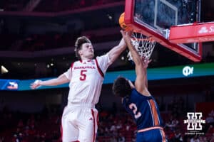 Nebraska Cornhusker Braden Frager (5) blocks a lay up against Midland Viking guard Amari Rahaman (2) in the first half during a college men’s basketball exhibition game on Monday, October 27, 2025, in Lincoln, Nebraska. Photo by John S. Peterson.