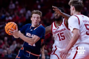 Midland Viking forward Nick Dolezal (21) drives to the basket against Nebraska Cornhusker Jared Garcia (15) in the first half during a college men’s basketball exhibition game on Monday, October 27, 2025, in Lincoln, Nebraska. Photo by John S. Peterson.